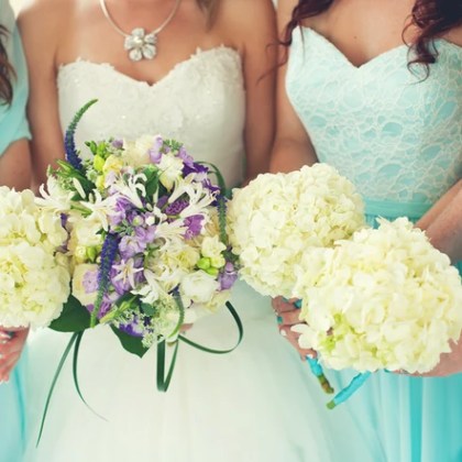 Bridal party holding bouquets