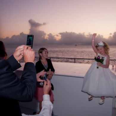 Little girl posing for a photo on a boat