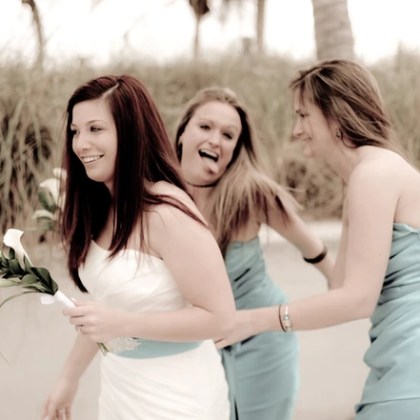 Bridal party posing for a photo making silly faces