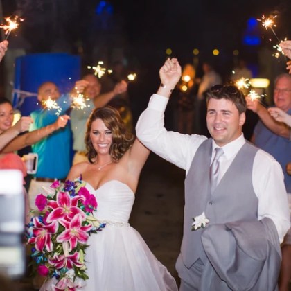 Bride and Groom holding hands